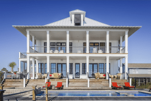 Luxury home with pool and white columns