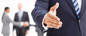 Businessman holding out hand for handshake