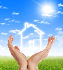 Hands holding white outline of a house - graphic